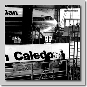 A 707 being re-titled with a DC10 in rear