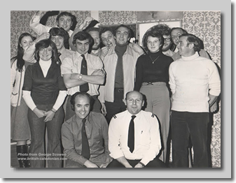 Darts Team:  Sue ?, Hazel?, ? , Guy Boyling, Roger Harris, George Scowen, Laurie Evans, Colin Williams, ?, Simon Rickard, Howard Meredith, Ken O'Connell, Front Row: John Rickman, Ken Woolley