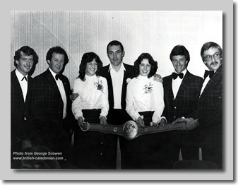 Second from left: Guy Le Sueur with Alan Minter (Boxer) and Jersey office staff